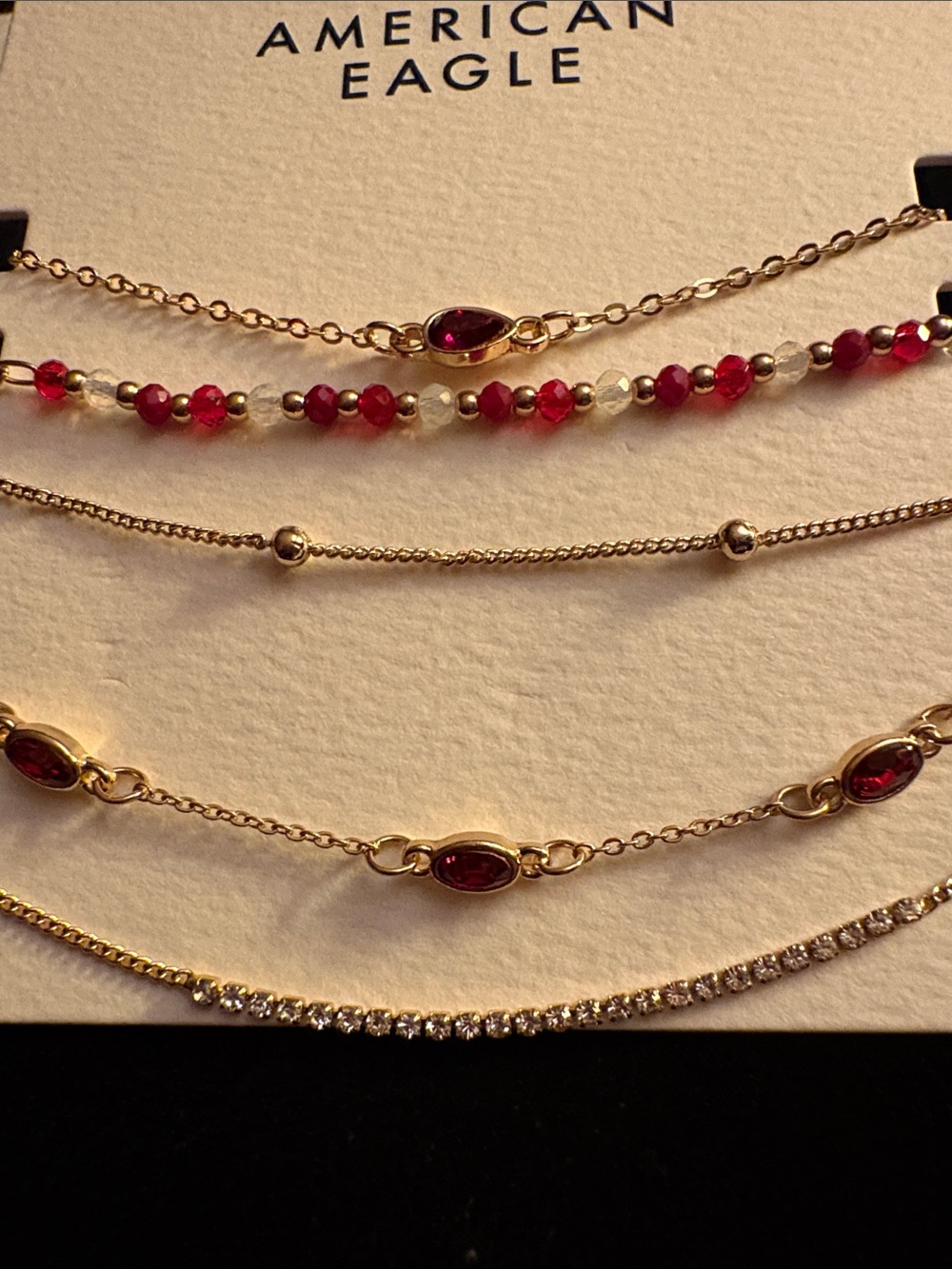 New American Eagle Outfitters Gold and Red Layered 5 Bracelet Set